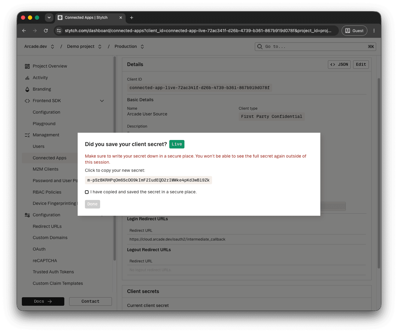 Did you save your client secret? dialog with the secret visible and the confirmation checkbox